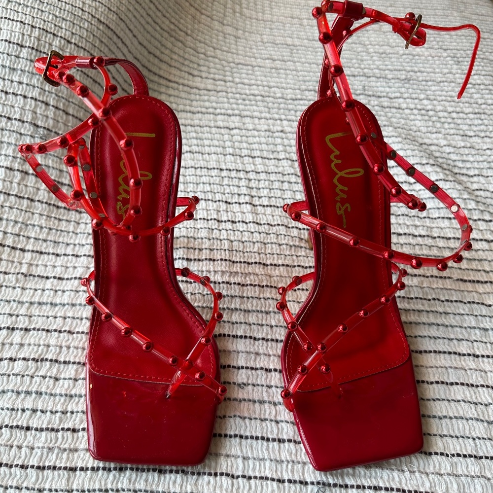 Never worn red heels